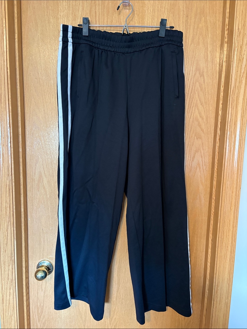 Athleta Black Wide-Leg Track Pants with White Side Stripes